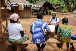 female facilitator raising awareness