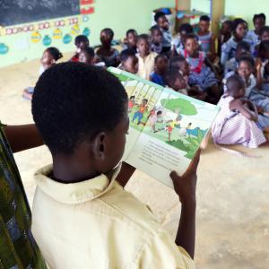 child reading book