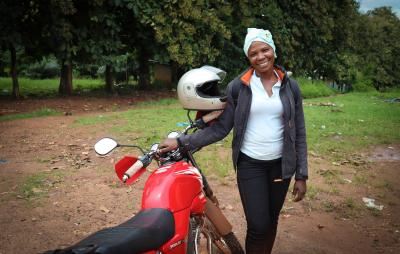 female agent with her motorbike