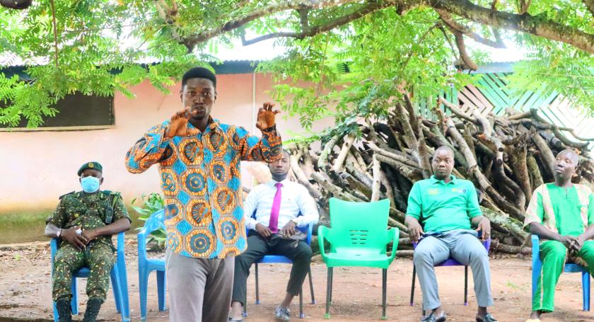 man speaks in workshop