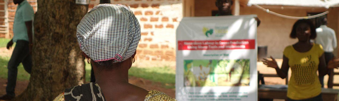 lady looking at awareness-raising poster